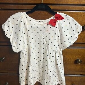 White Kids Top with Black and Gold Accents
